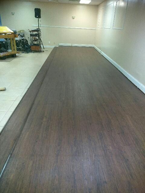 church stage in vinyl plank finished